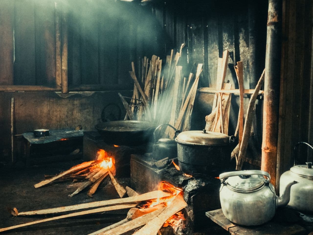 A traditional school kitchen cooking over firewood